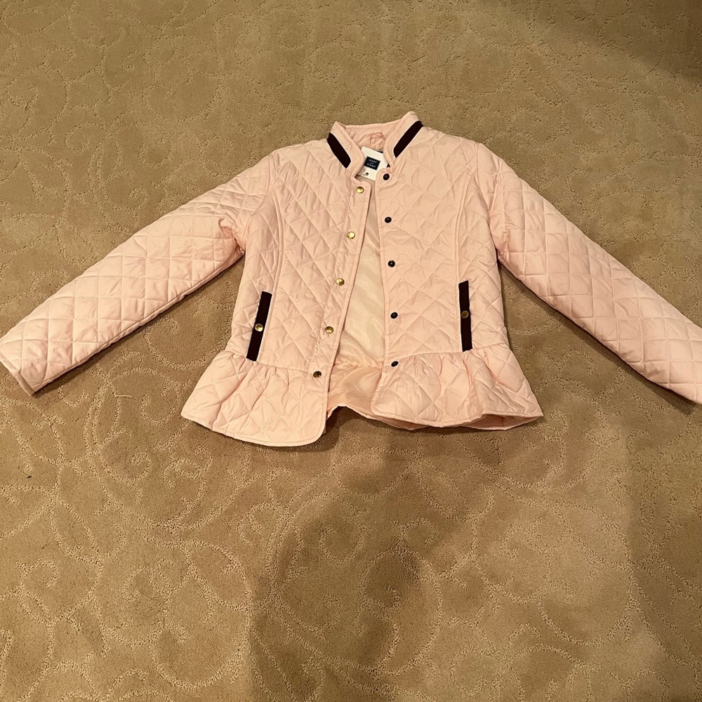 Girls pink jacket with brown details.